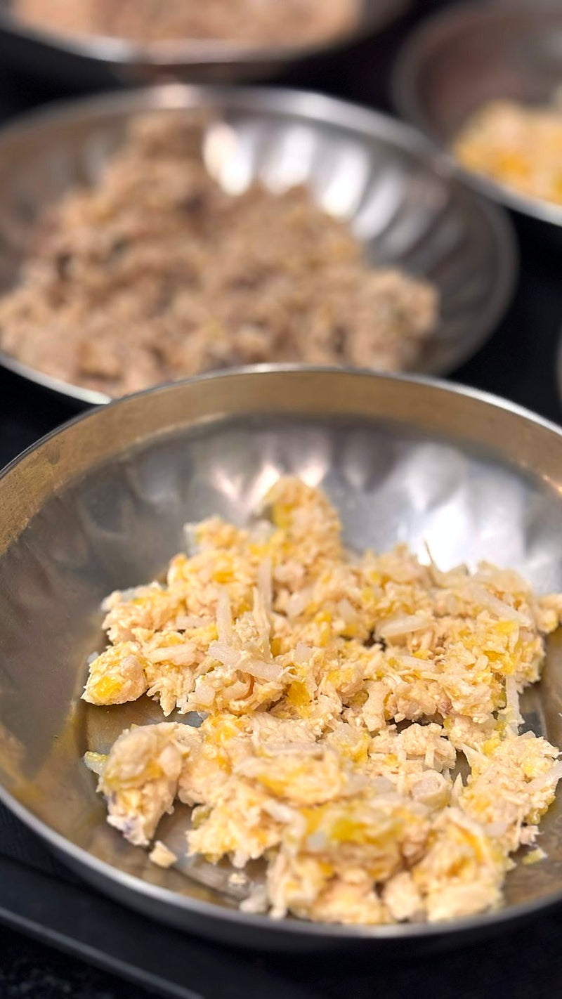 A freshly cooked meal in a steel bowl