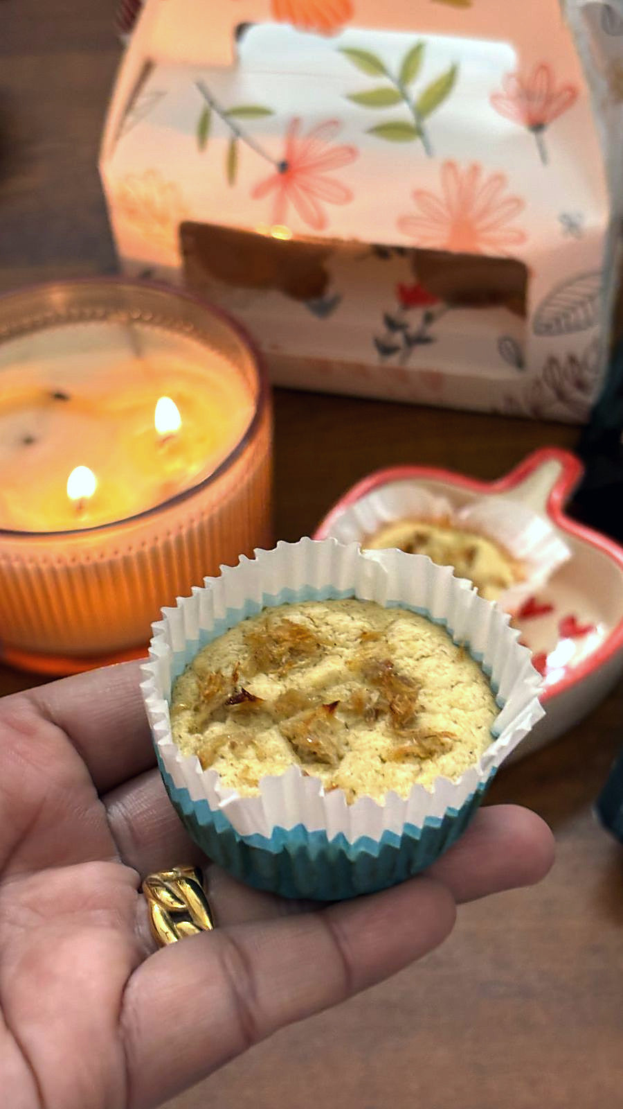 A cupcake held in a hand