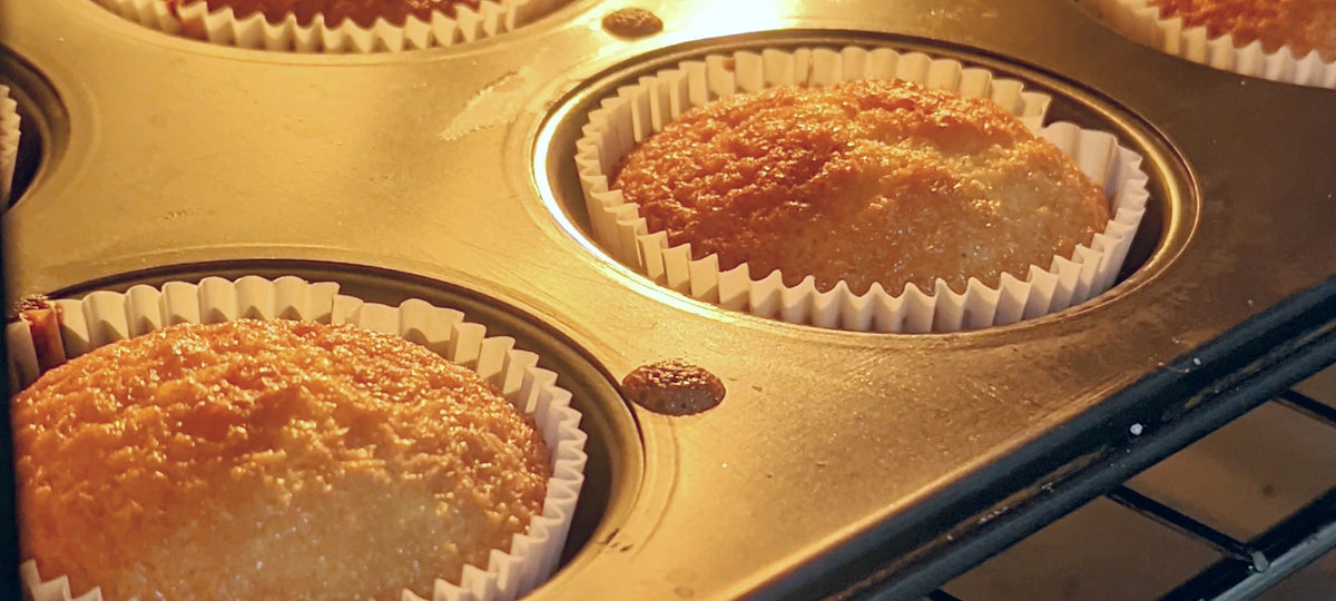 Cupcakes baking in a muffin tray